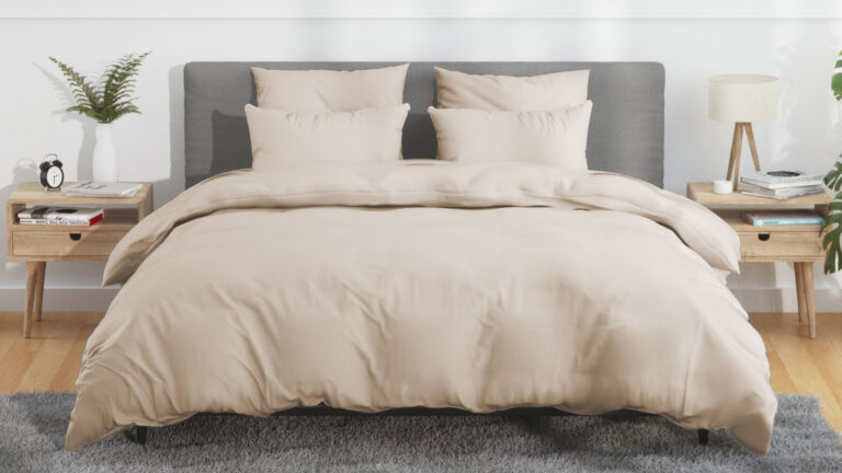 Bedroom with beige cotton sateen duvet covers and sheets