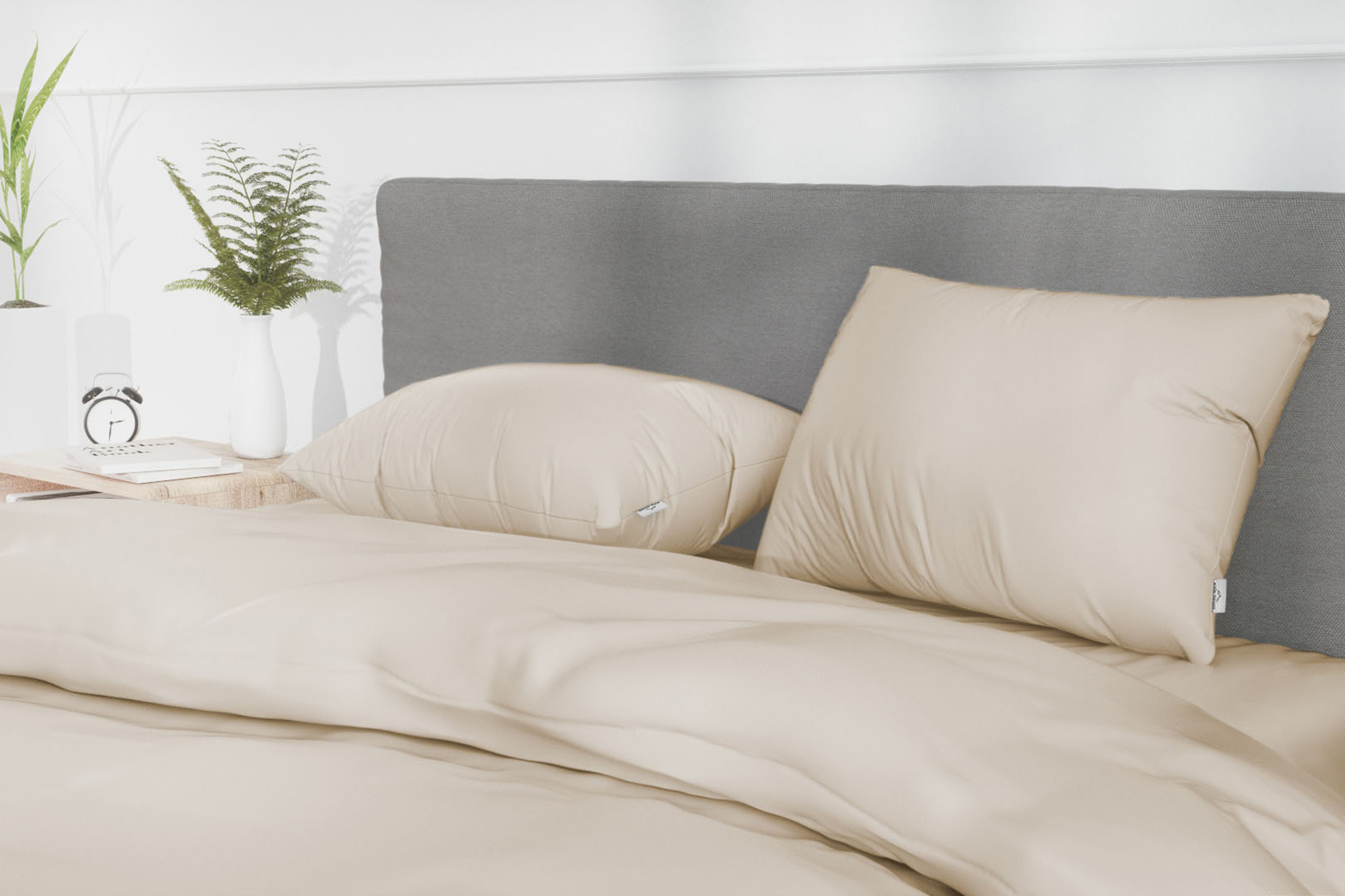 Bedroom with beige cotton sateen bedsheets